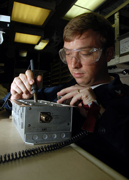 File:Pulse Amplifier Soldier from Tampa Florida Solders a Trigger Pulse Amplifier.jpg