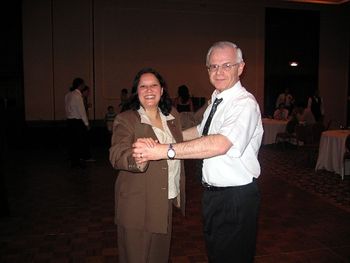 Dancing with Tania Quiel, Panama, R9 Director-elect at the R9 Committee Meeting dinner in Santiago, Chile, in March 2009.