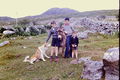 Mark with local boys,donkey and dog.