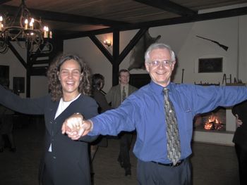 Dancing a cha-cha-cha with R8 Committee member Pilar Molina, Spain, in Krakow, Poland, April 2004. (Dancing in the background is Maciey Ogorzalek, Poland; a future society president and director.)