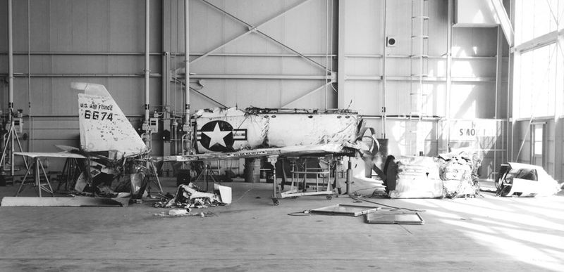 File:62. X-2 Wreckage in Hangar.jpg