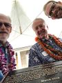 Left to right: Thomas Coughlin, Jim Jeffries, and John Hofman with Electric Lighting of Hawaii plaque