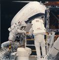 Repairing the Solar Maximum Mission satellite in the space shuttle payload bay