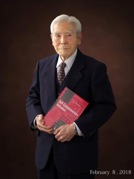 File:Prof Mushiake with book.jpg
