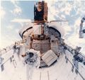 Repairing the Solar Maximum Mission satellite in the space shuttle payload bay